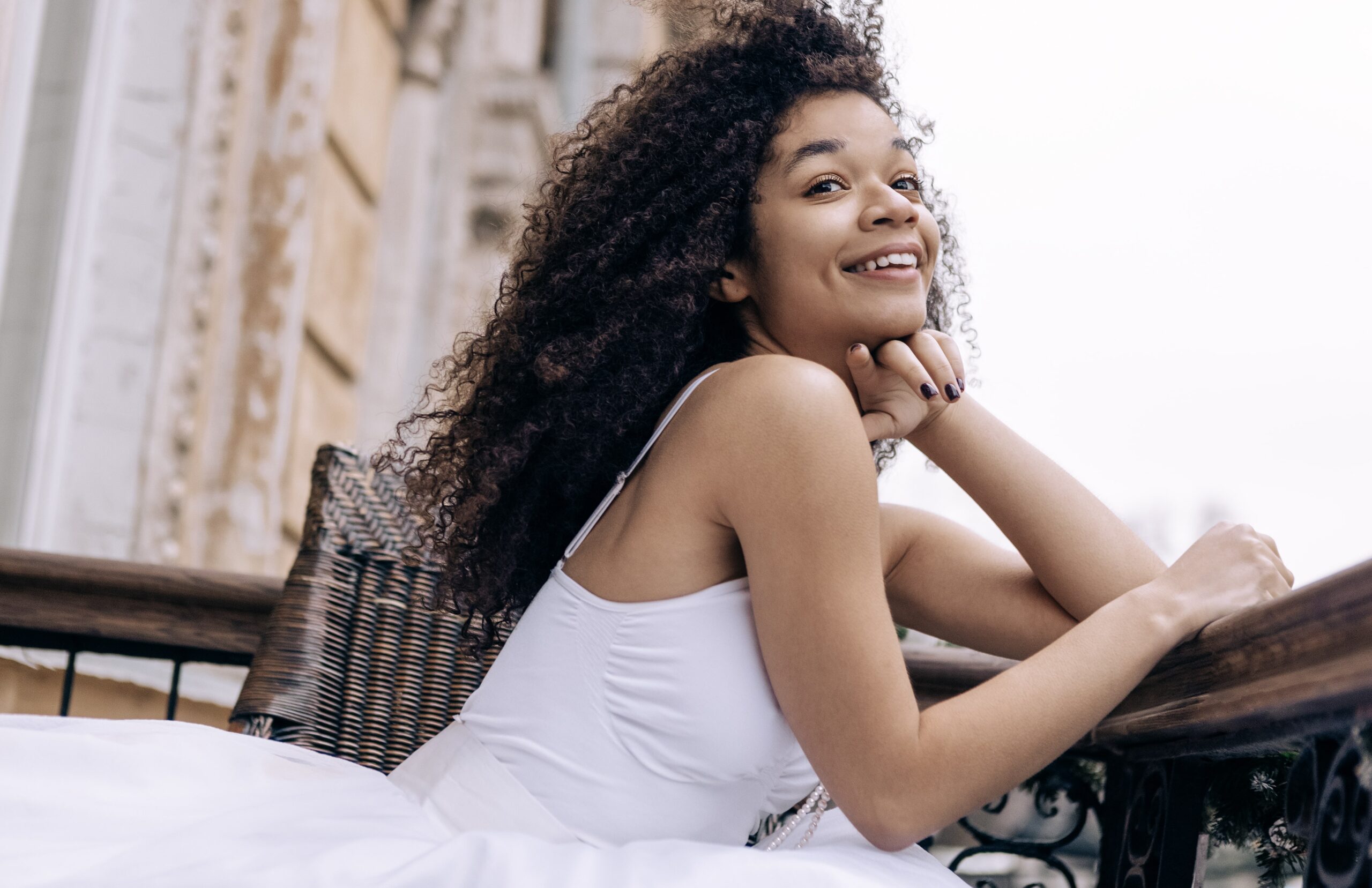 a-young-african-woman-in-an-elegant-white-dress-an-2025-06-05-15-59-46-utc (1)-min